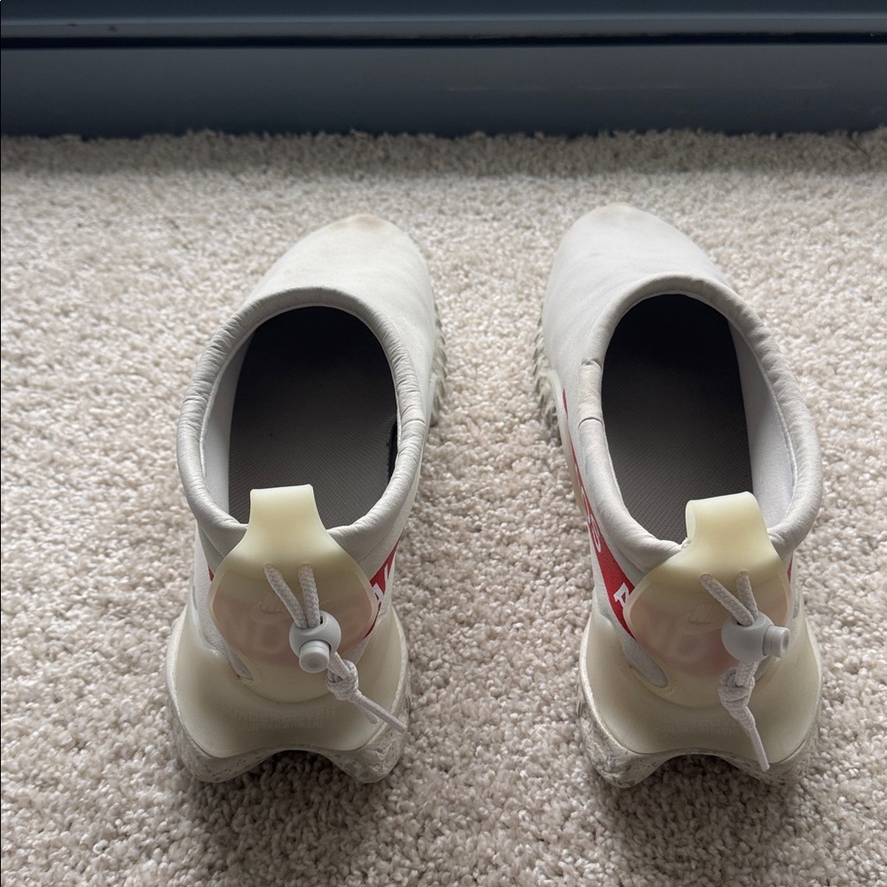 The Nike Moc Flow SP Undercover Light Bone Sneakers